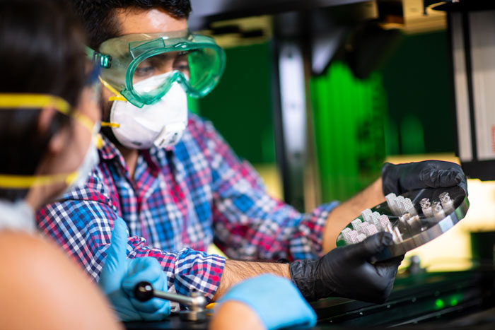 Student wearing protective gear in lab